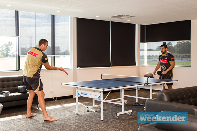 Players relax with a little table tennis in the recreation room. Photo: Megan Dunn