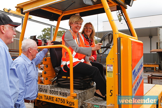 Member for Lindsay Fiona Scott and Foreign  Minister Julie Bishop on the Trackhaul at RKR  Engineering in Emu Plains. Photo: Melinda Jane