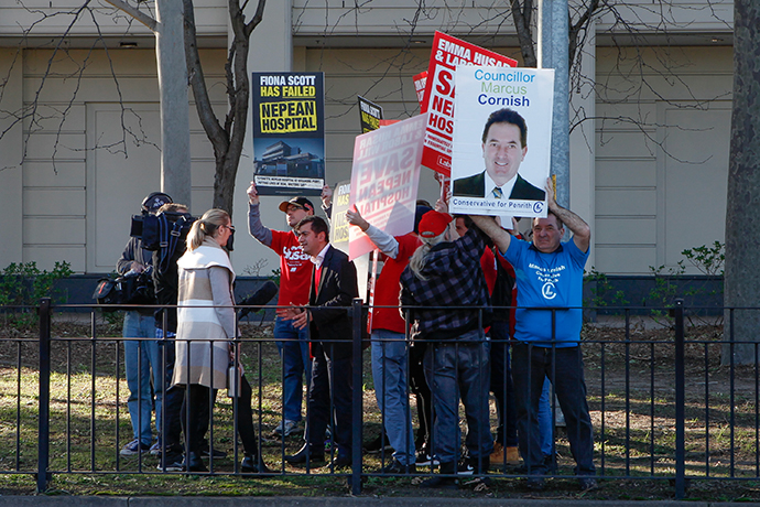 Marcus Cornish disrupts a Labor visit yesterday