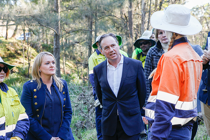 Greg Hunt and Fiona Scott with Green Army members on Wednesday. Photo: Melinda Jane