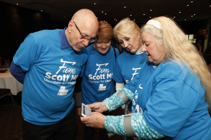 Liberal supporters watch the results come in closely. Photo: Melinda Jane