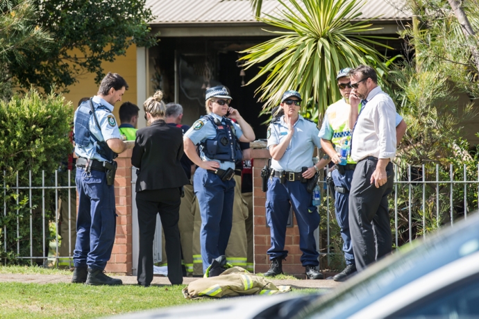 Police and emergency services on the scene. Photo: Megan Dunn