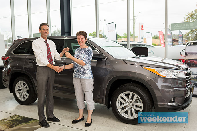 Veronica Brown receives the keys to her car. Photo: Megan Dunn