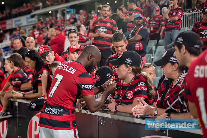 Romeo Castelen mixes with fans after the game last weekend. Photo: Megan Dunn